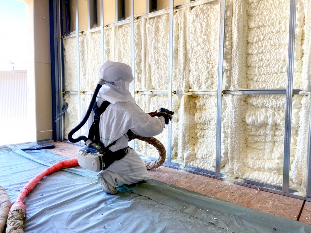 Isolation murs polyuréthane projeté - Top'Isol